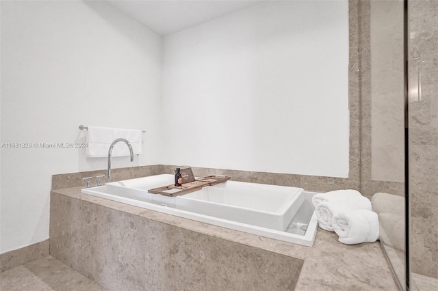 bathroom featuring vanity, a shower with shower door, and tile patterned floors