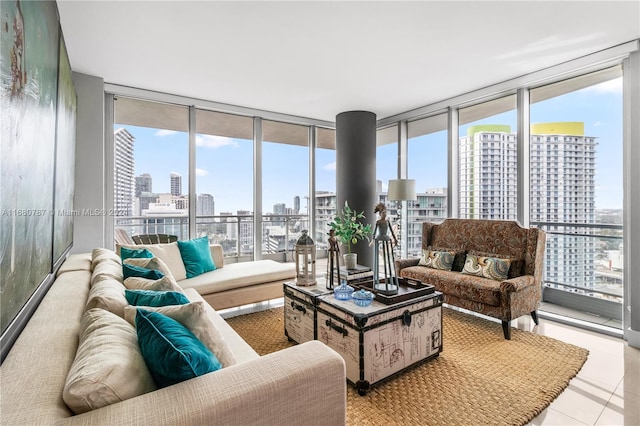 tiled living room with floor to ceiling windows