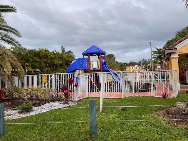 view of jungle gym with a yard