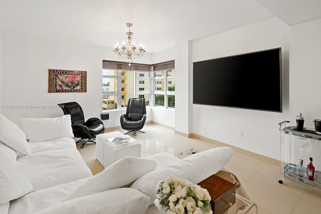 living room featuring light tile patterned floors and a chandelier