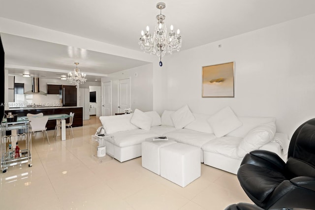 tiled living room featuring a notable chandelier