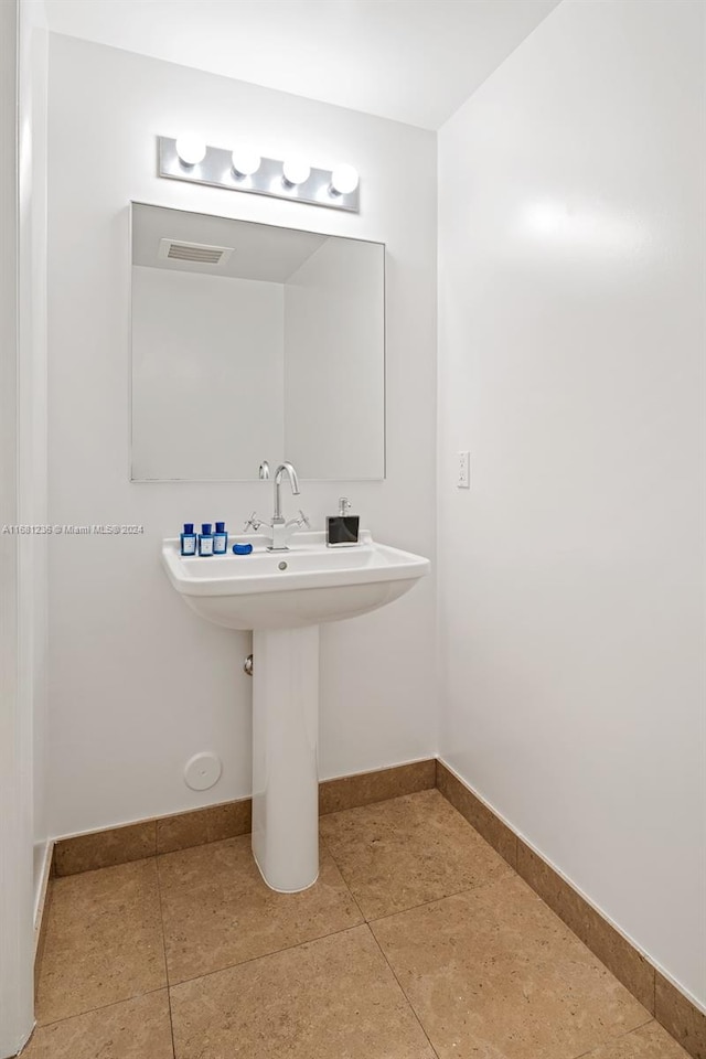 bathroom featuring tile patterned flooring