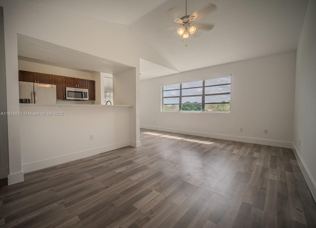 unfurnished living room featuring ceiling fan, lofted ceiling, and dark hardwood / wood-style flooring