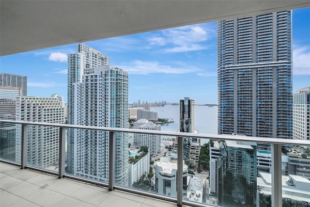 balcony featuring a water view