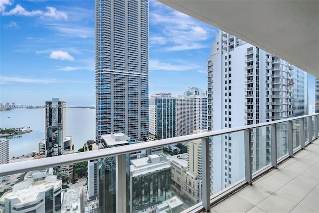 balcony featuring a water view