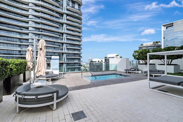 view of pool with an outdoor living space