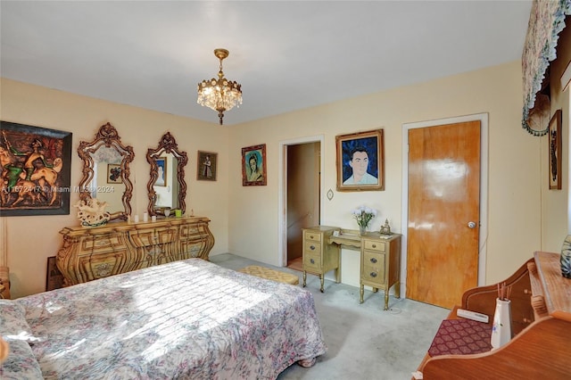 bedroom featuring a chandelier and light colored carpet