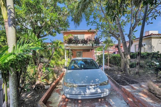 view of front of house featuring a carport