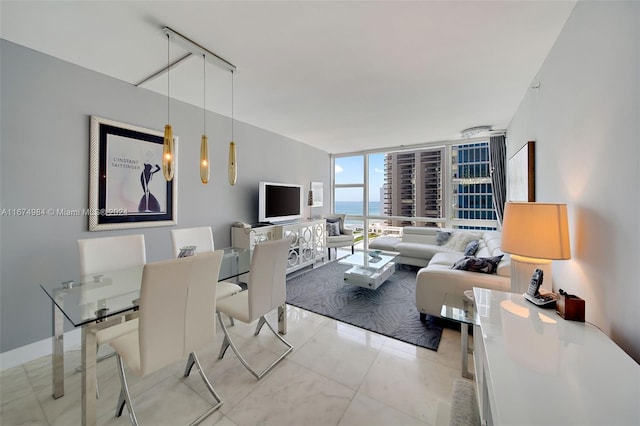 living room with floor to ceiling windows