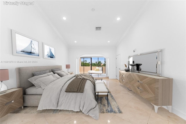 bedroom with lofted ceiling, ornamental molding, and light tile patterned floors