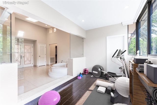 workout room featuring wood-type flooring