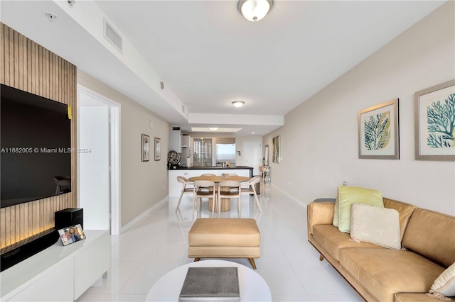 living room featuring light tile patterned flooring