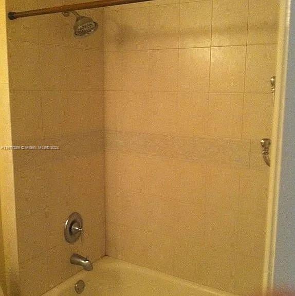2394 NW 97th Way Unit 2394, Pembroke Pines, FL 33024 - bathroom featuring bathing tub / shower combination