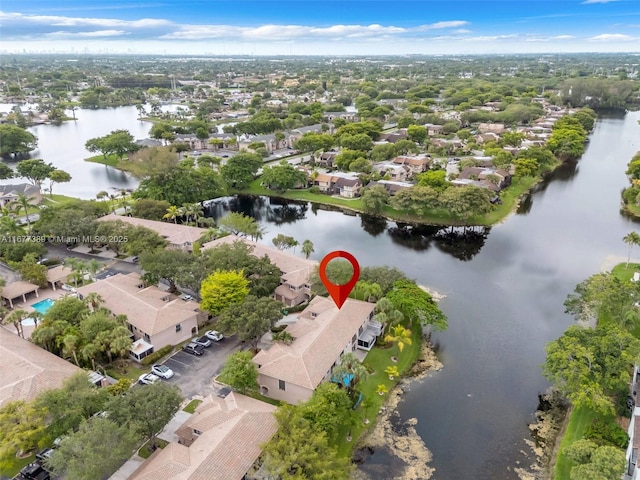 2394 NW 97th Way Unit 2394, Pembroke Pines, FL 33024 - aerial view of property and surrounding area featuring a large body of water and nearby suburban area