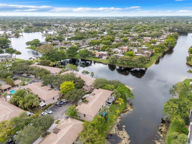 2394 NW 97th Way Unit 2394, Pembroke Pines, FL 33024 - aerial perspective of suburban area featuring a large body of water