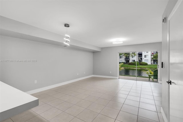 2394 NW 97th Way Unit 2394, Pembroke Pines, FL 33024 - unfurnished room with light tile patterned floors and a water view