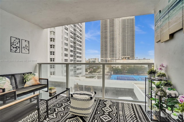 balcony featuring a view of city