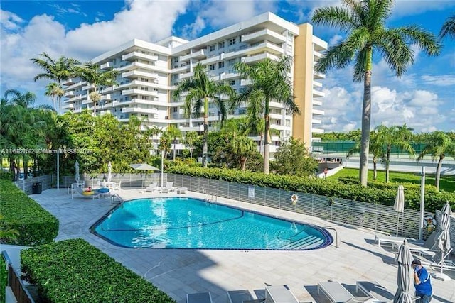 view of swimming pool with a patio