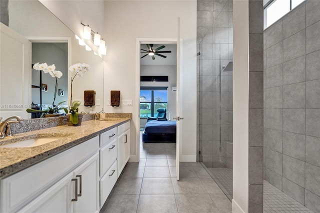 full bath featuring ensuite bath, a walk in shower, a sink, and tile patterned floors