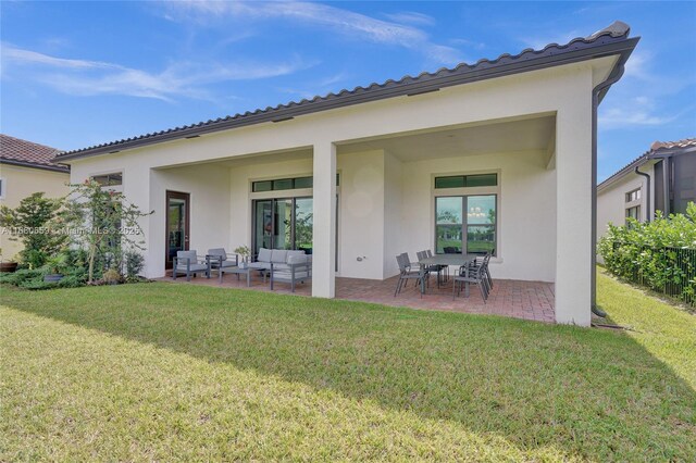 view of patio with an outdoor living space and a water view