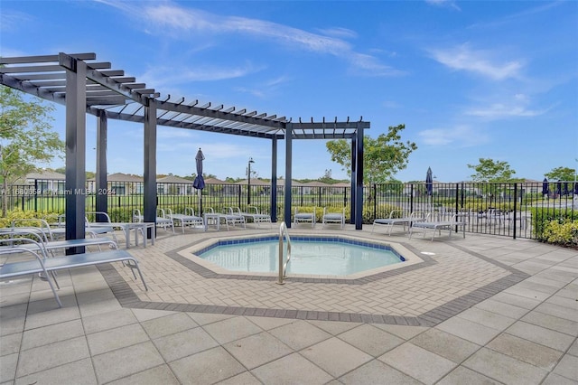 view of swimming pool with a pergola and a patio area