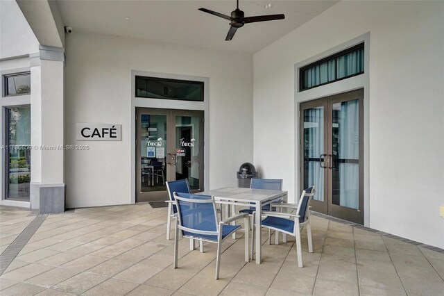 view of patio with ceiling fan and french doors