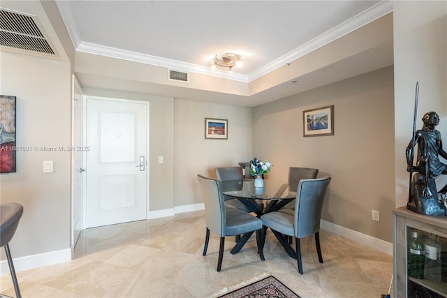 dining space featuring ornamental molding