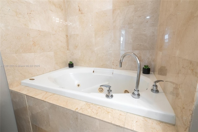 bathroom featuring a relaxing tiled tub