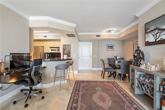 office area featuring ornamental molding and a textured ceiling