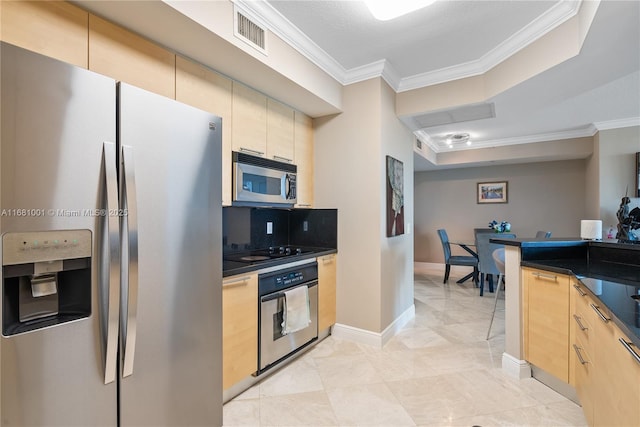 kitchen with crown molding, appliances with stainless steel finishes, light brown cabinetry, and decorative backsplash