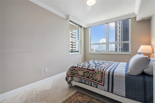 bedroom with crown molding and ceiling fan