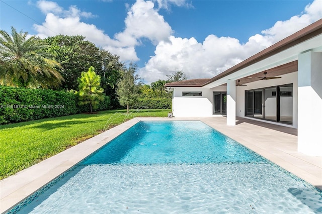 7720 SW 130th St, Pinecrest, FL 33156 - outdoor pool featuring a yard, a ceiling fan, and a patio area