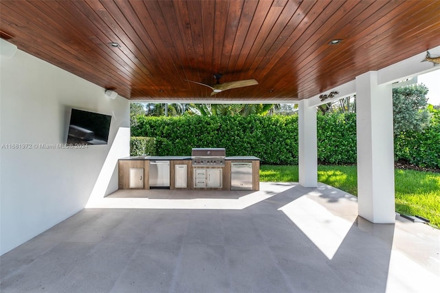 view of patio featuring area for grilling and ceiling fan