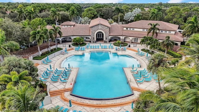 view of swimming pool with a patio