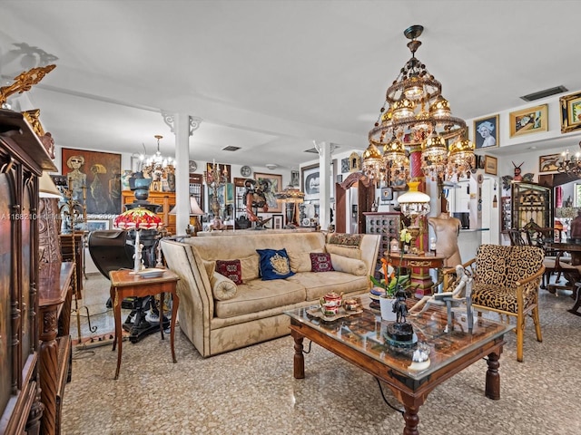 living room featuring an inviting chandelier