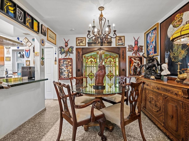 dining room with a chandelier