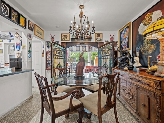 dining room featuring a chandelier