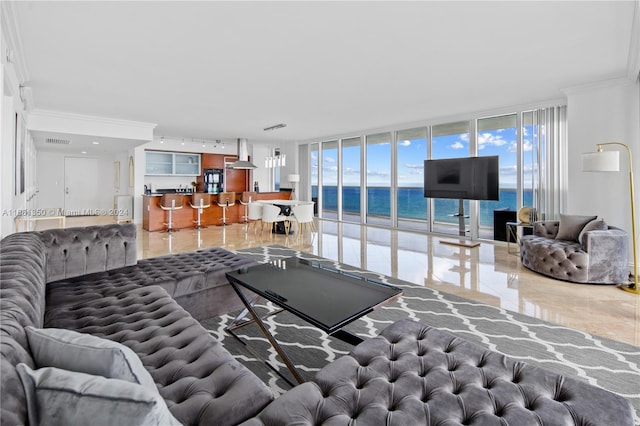 living room with expansive windows and ornamental molding