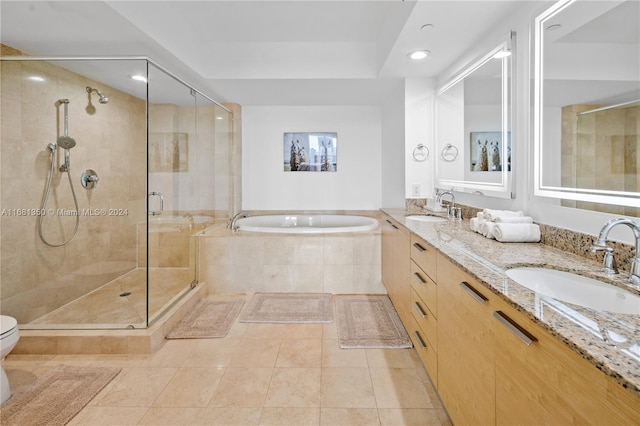 full bathroom with vanity, independent shower and bath, toilet, and tile patterned flooring