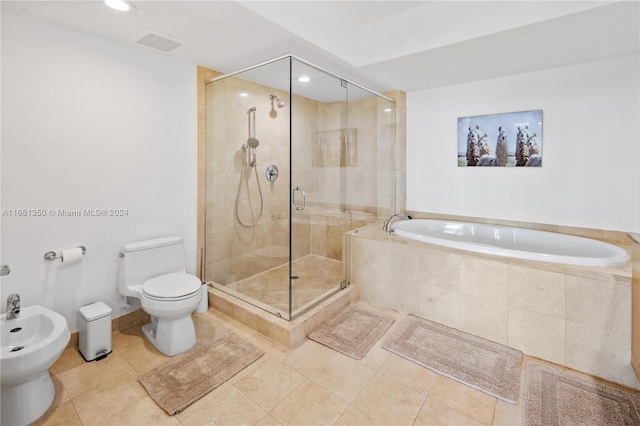 bathroom featuring toilet, tile patterned floors, a bidet, and plus walk in shower