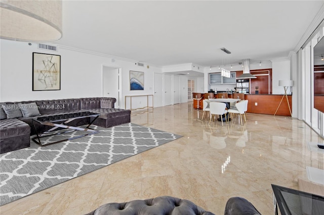 living room featuring crown molding