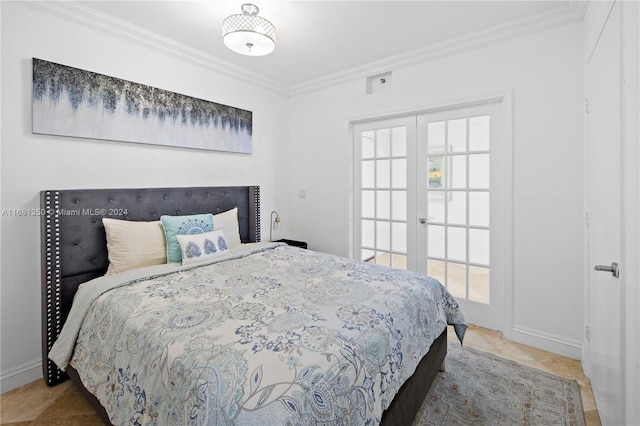 bedroom with french doors and crown molding