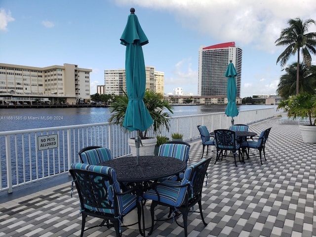 view of patio featuring a water view