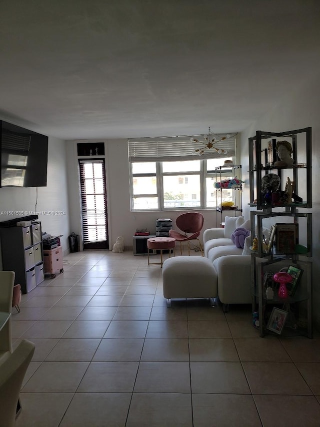 tiled living room featuring a healthy amount of sunlight