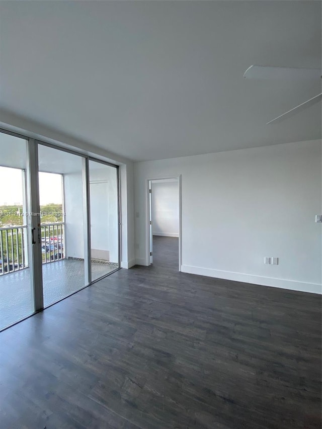 empty room featuring dark hardwood / wood-style floors