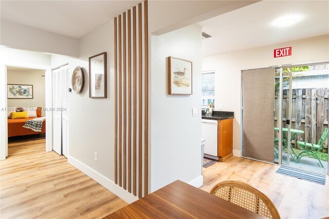 hall featuring light hardwood / wood-style floors