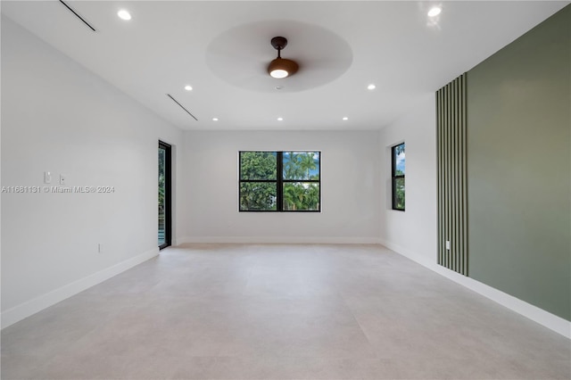 spare room with ceiling fan