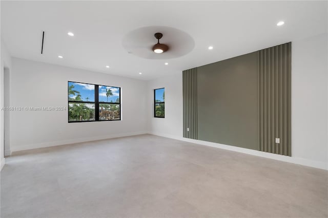 spare room with ceiling fan