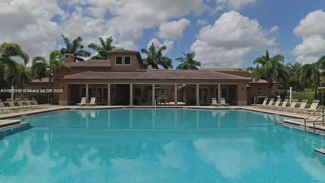 view of pool featuring a patio area