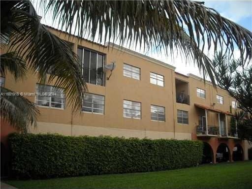 1305 W 53rd St Unit 410, Hialeah, FL 33012 - view of building exterior